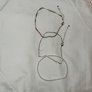 Three anklets